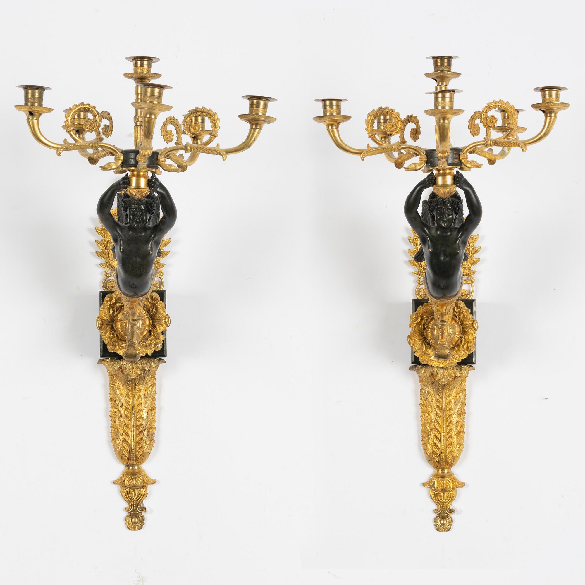 A pair of Empire style appliques, circa 1900.