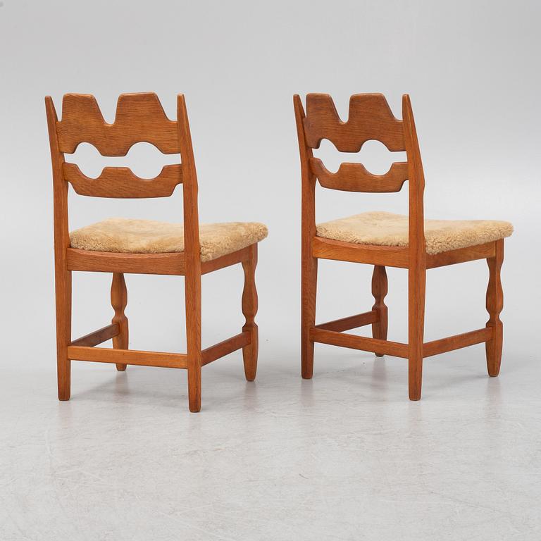 Henning Kjærnulf, a set of six oak 'Razorblade' chairs with new sheepskin upholstery, Nyrups, Denmark, 1960s.