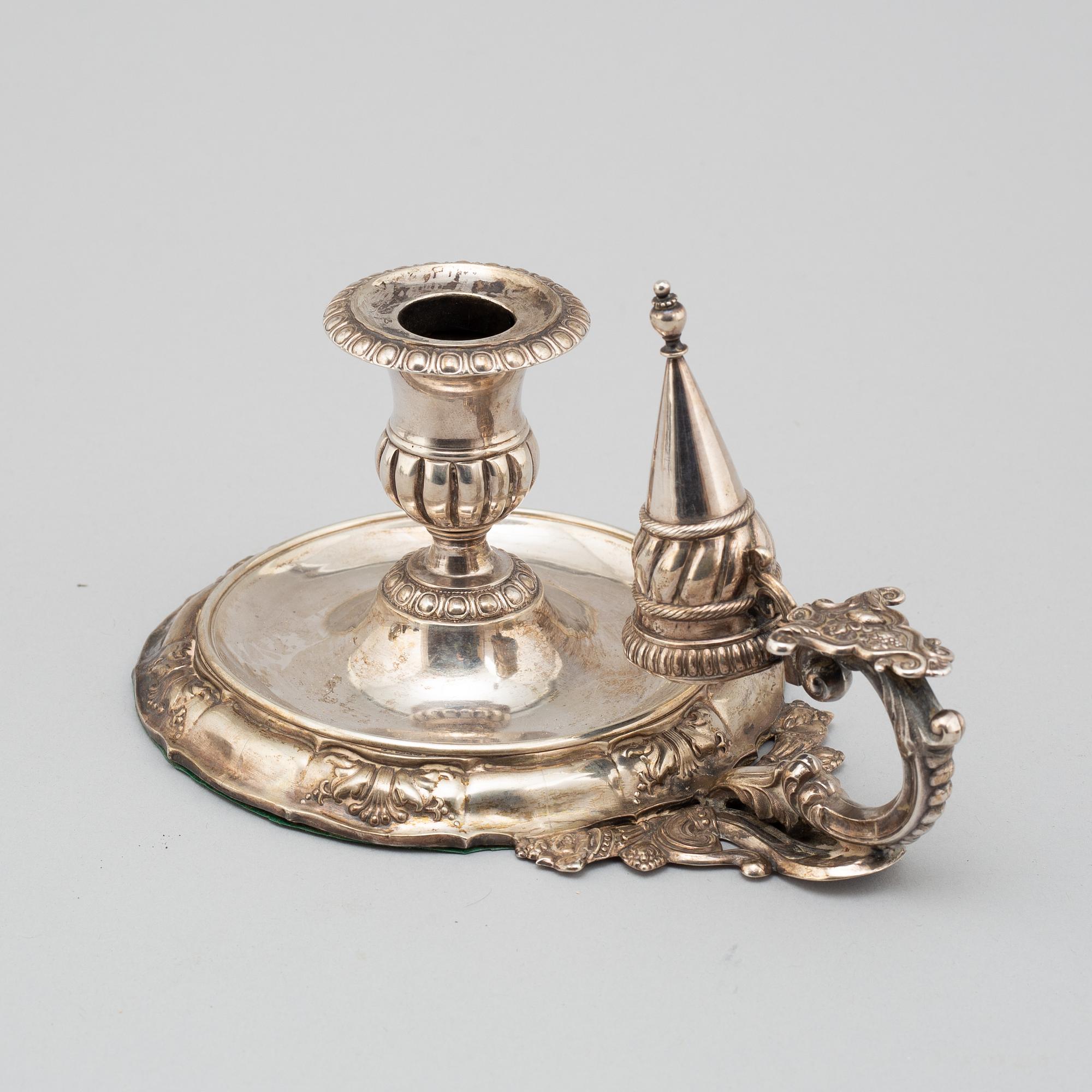 A SILVER NIGHT LIGHT HOLDER, rococo style, second half of the 19th century.