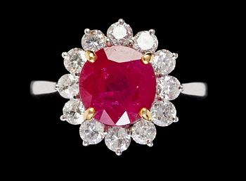 933. A ruby and diamond ring, tot. app. 0.70 cts.