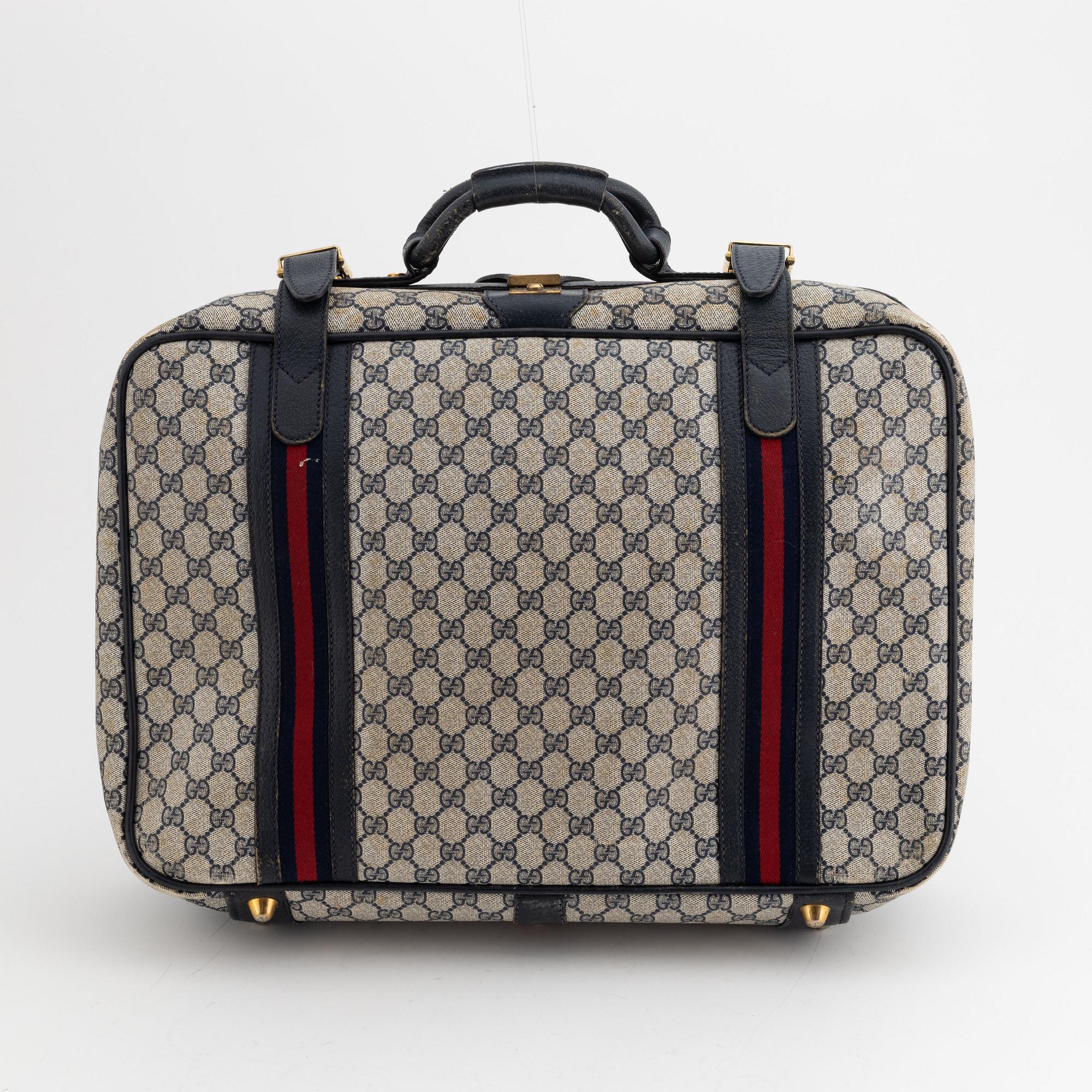 Gucci, resväska.