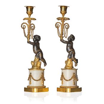 A pair of presumably German Louis XVI candlesticks, circa 1800.