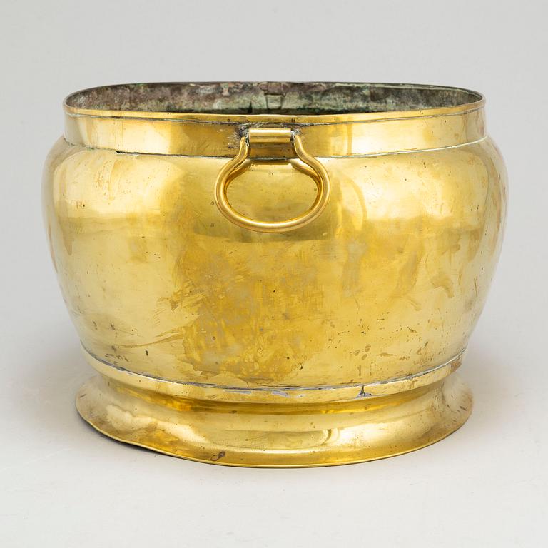 A brass champagne cooler, possibly 17th Century.