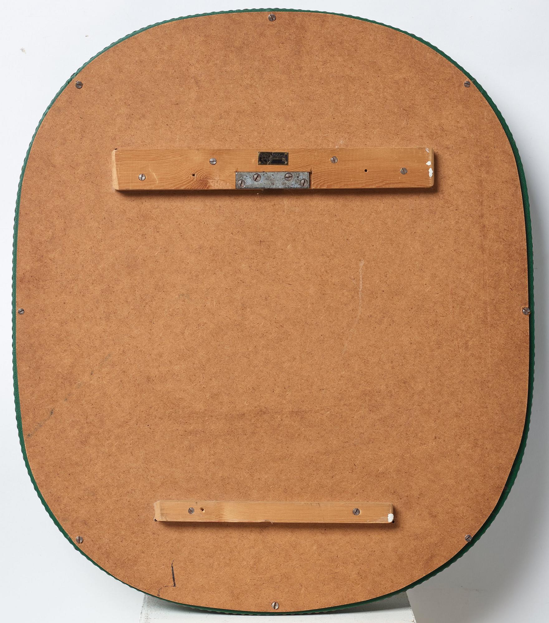 Otto Schulz, an artifical leather framed wall mirror, Boet, Gothenburg, Sweden 1940-50's.