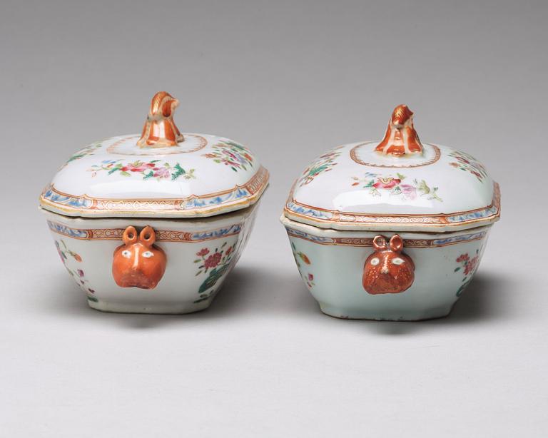 A pair of famille rose 'double peacock' butter tureens with cover and stand, Qing dynasty, Qianlong (1736-95).