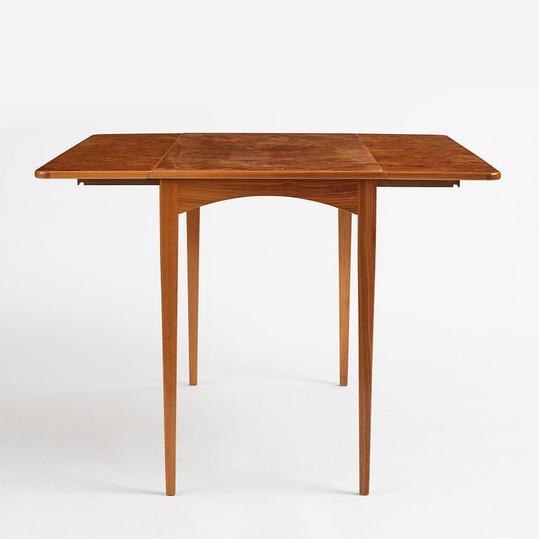 Josef Frank, a mahogany dinner table with burled wood top, Svenskt Tenn Sweden 1940s-50s.