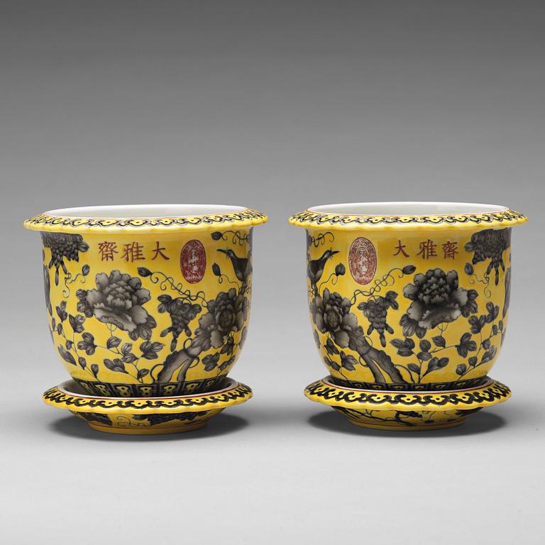 A pair of yellow glazed Dayazhai mark flower pots with stands, Republic, 20th Century.