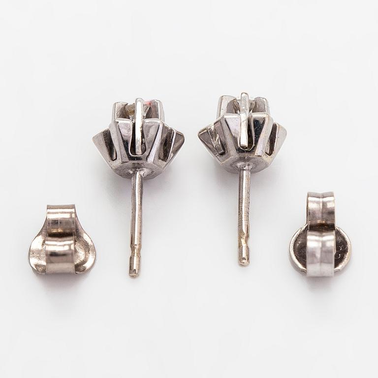A pair of 14K white gold earrings, with brilliant-cut diamonds totalling approximately 0.06 ct. Finnish hallmarks.
