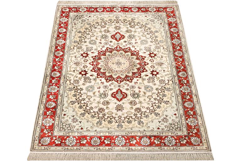 A carpet, Turkey, silk, c. 180 x 120 cm.
