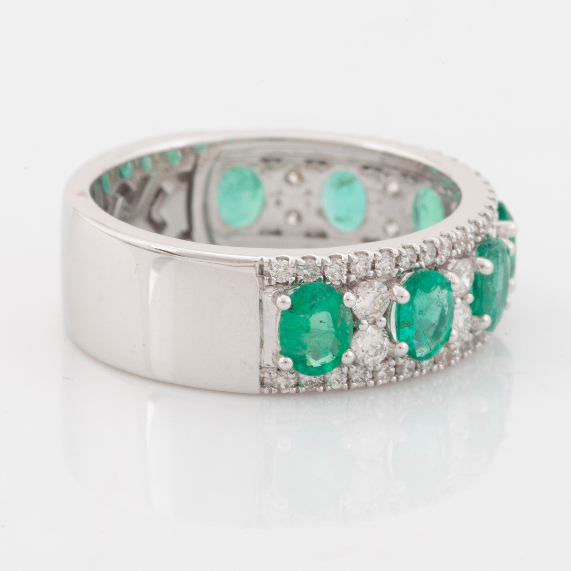 Emerald and brilliant cut diamond ring.