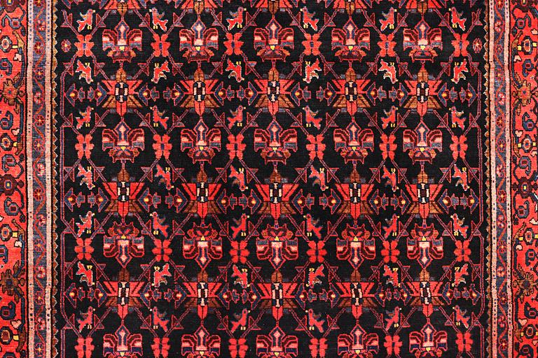 A Borujerd carpet, c. 300 x 225 cm.