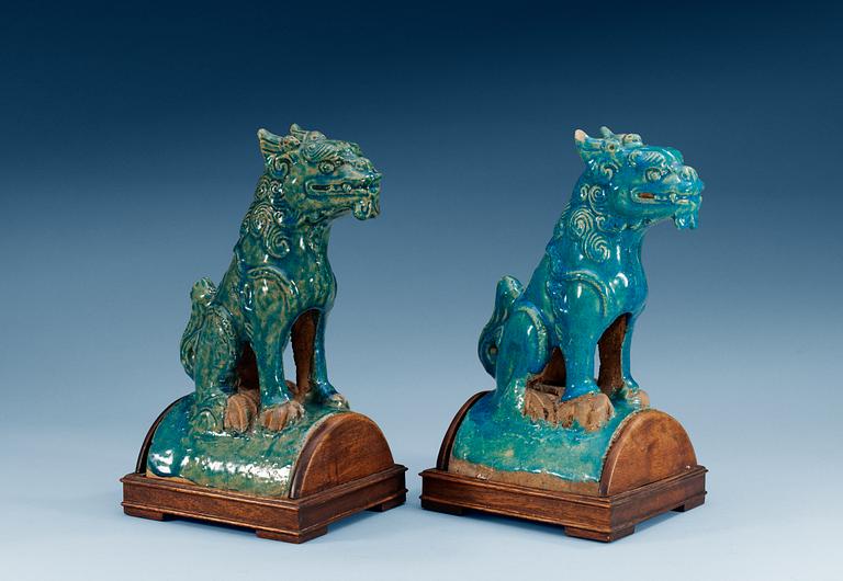 A pair of turquoise-glazed fable figures, Ming dynasty, 17th Century.