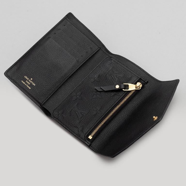 Louis Vuitton, a black Monogram Empreinte leather 'Curieuse' wallet, 2015.