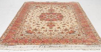 Rug, Tabriz, approx. 305 x 203 cm.