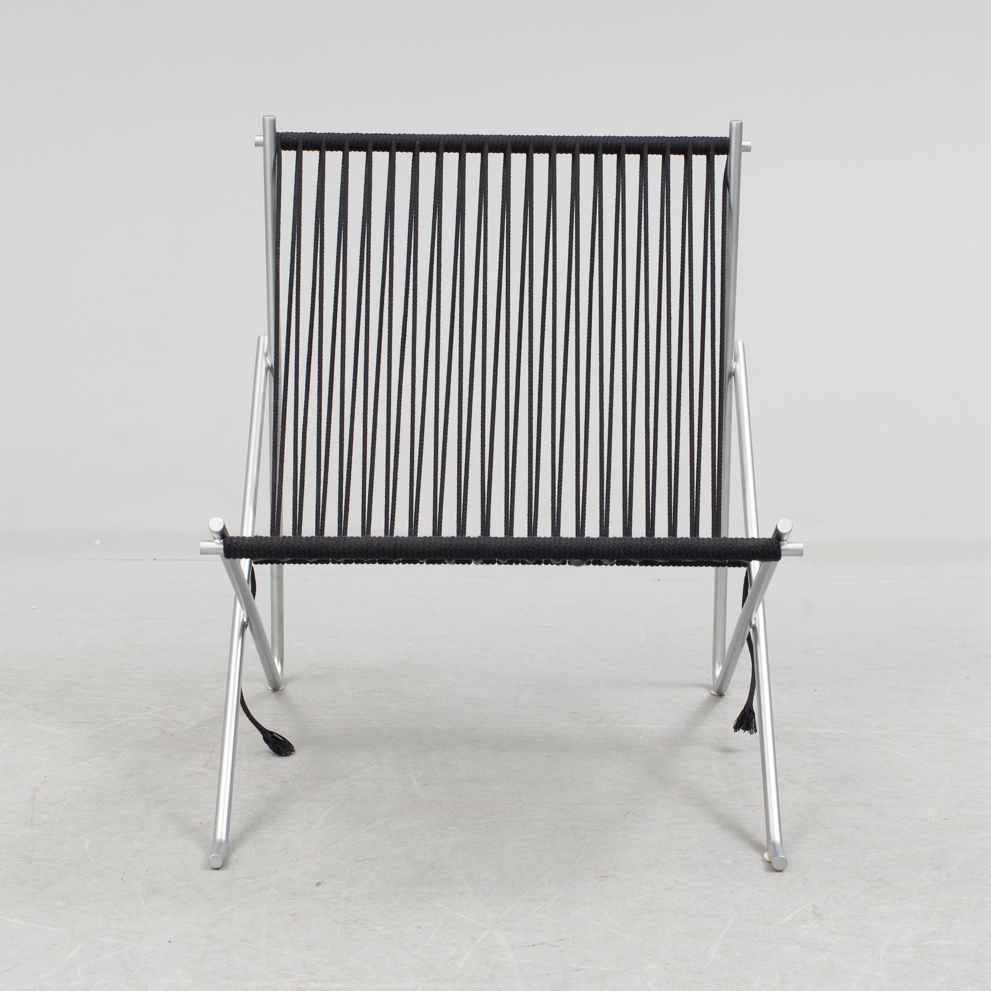 A "PK-4" chair by Poul Kjaerholm, Denmark.