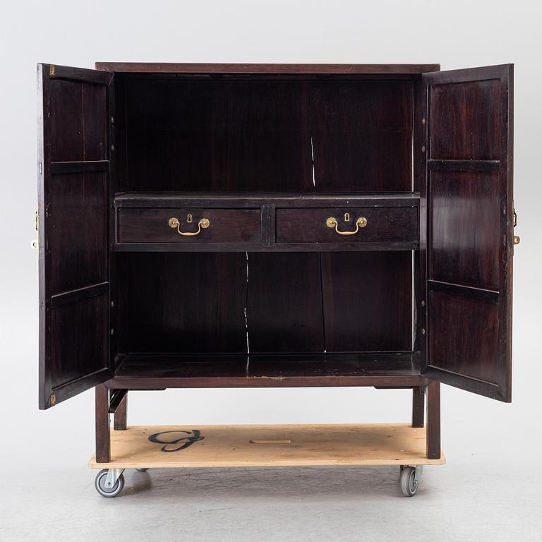 A hardwood cabinet, China, 20th century.