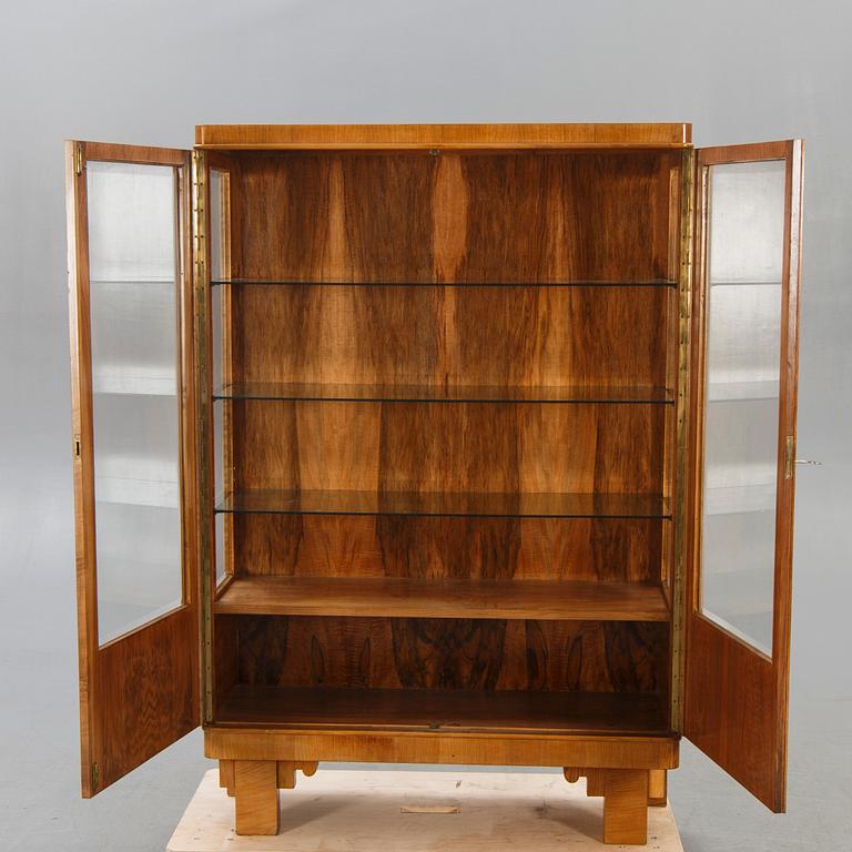 A walnut 1930740s display cabinet.