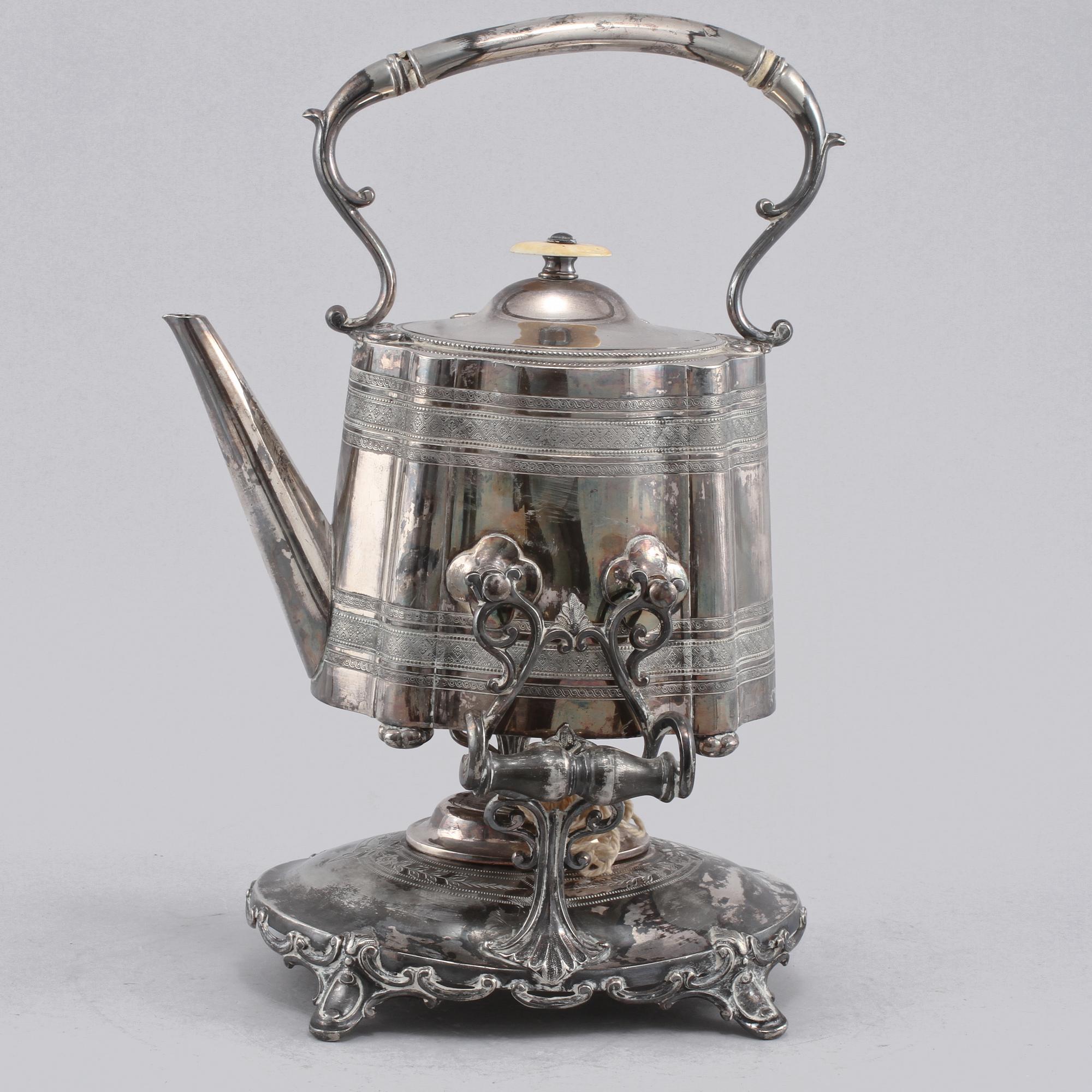 TEKANNA MED VÄRMESTÄLL, nysilver, 1900-tal.