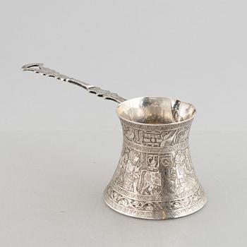 A silver 800 tray and coffee pot, and six glasses without marks. Probably Egypt.