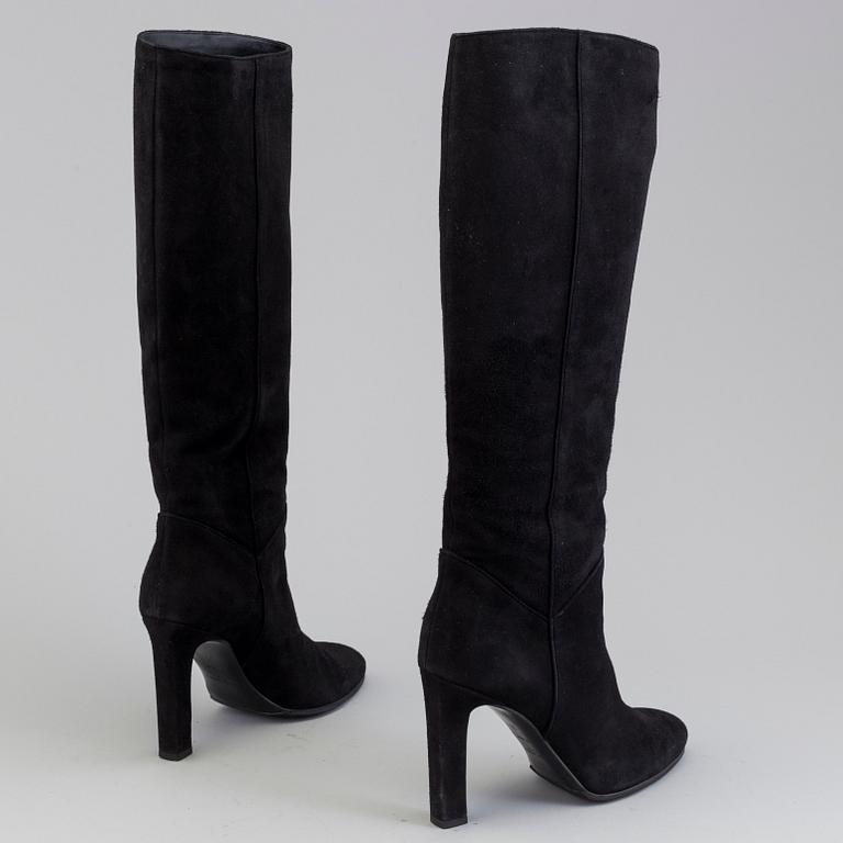 Black suede boots by Yves Saint Lurent.