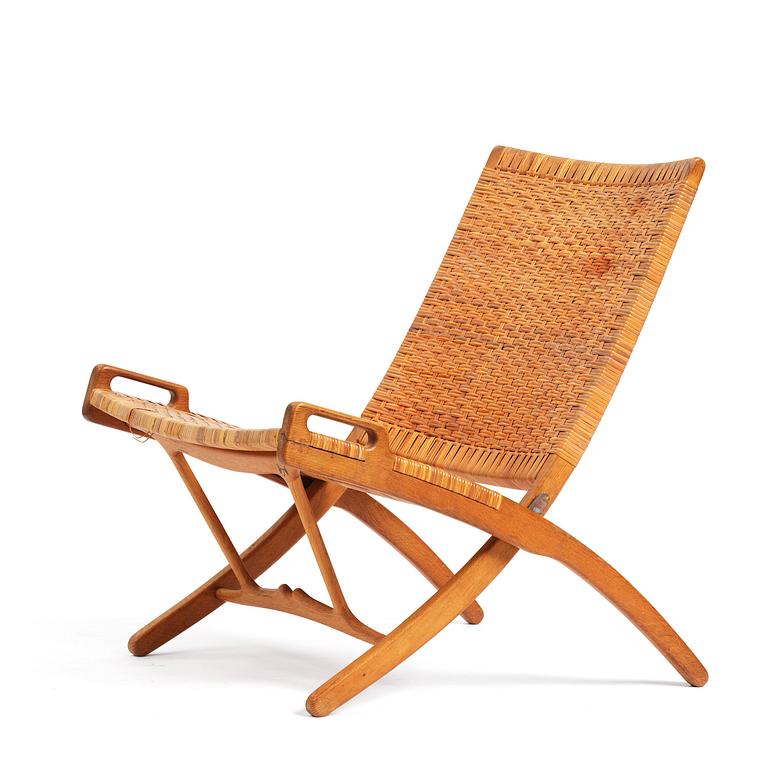 Hans J. Wegner, a foldable easy chair model 512, Johannes Hansen, Copenhagen, 1950s-60s.