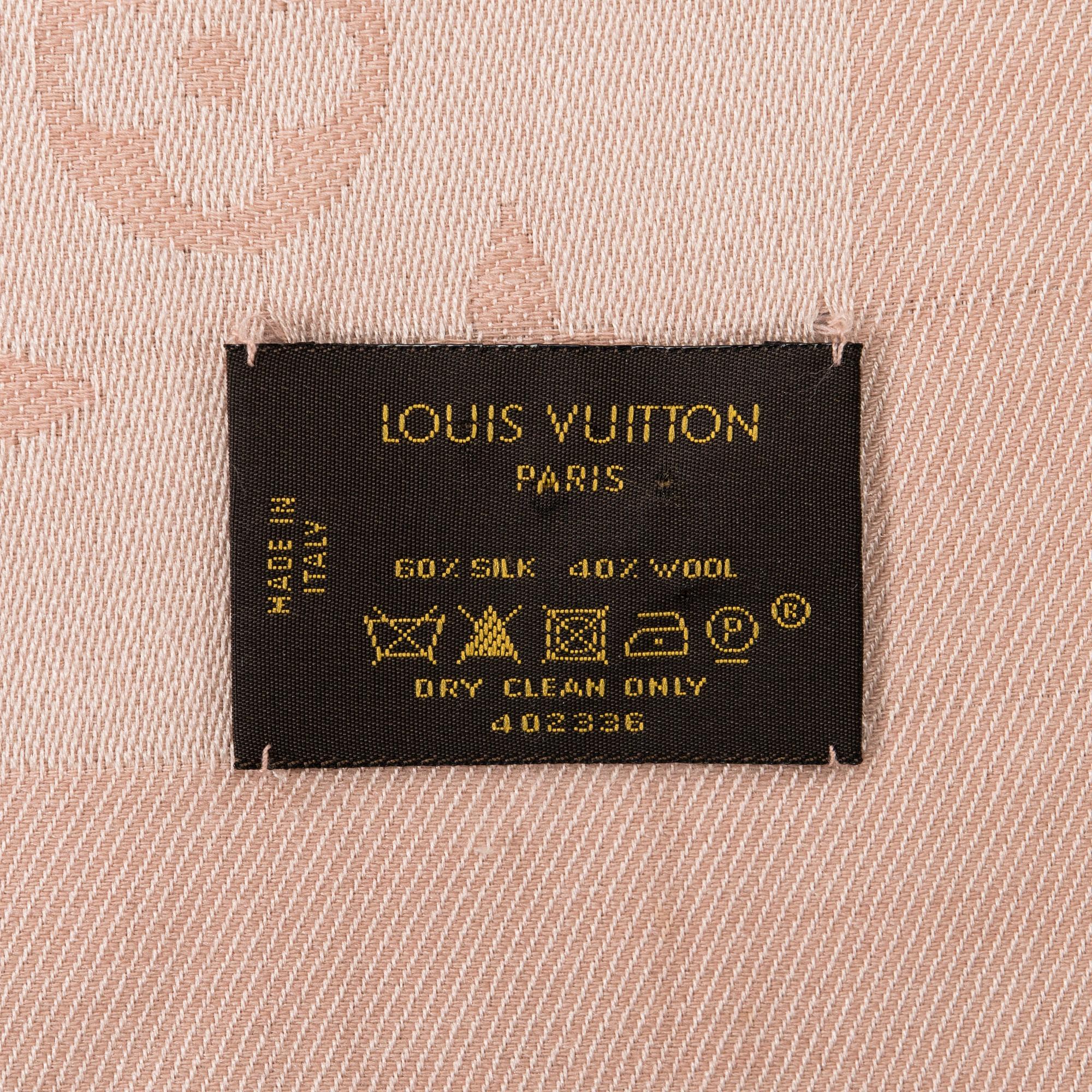 Louis Vuitton, a 'Monogram Classic Shawl'.