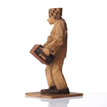 Axel Petersson Döderhultarn, Standing accordionist.