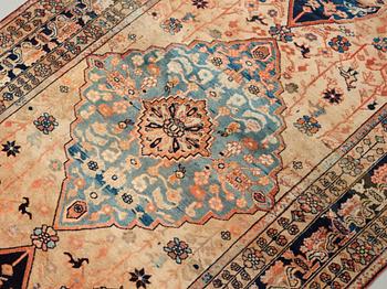 A RUG. An antique Kashan part silk, a so called Motachem. 200 x 95,5-108 cm.
