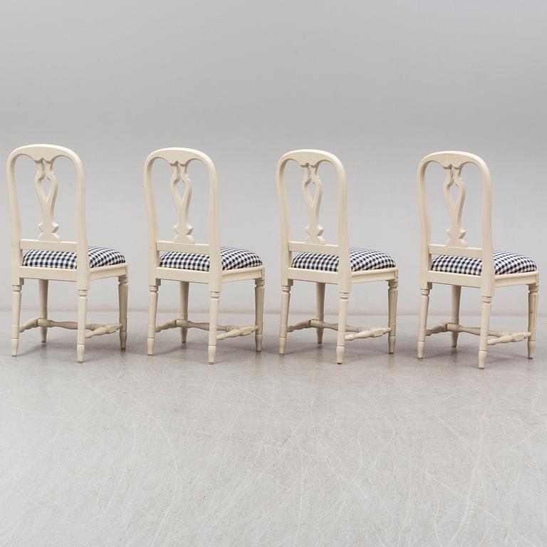 Four Swedish Gustavian style 'Hallunda' dining chairs from IKEA's 18th century collection.