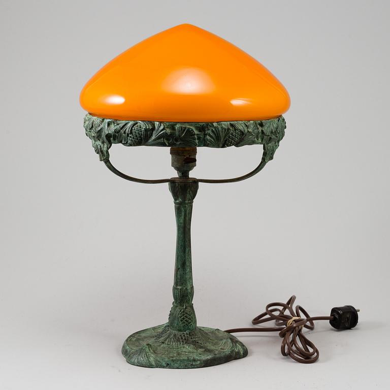 A bronze table light from Böhlmarks, 1907-24.