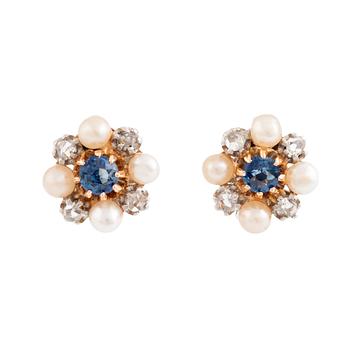 A pair of 18K gold and silver earrings set with rose-cut diamonds, pearls and blue stones.