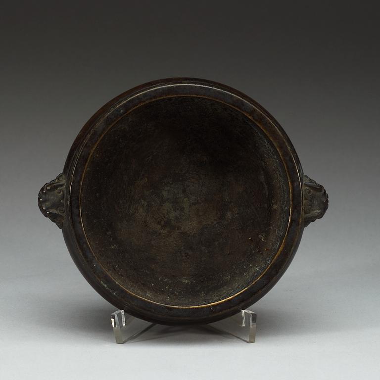 A bronze tripod censer, Qing dynasty (1644-1912), with Xuande six character mark.