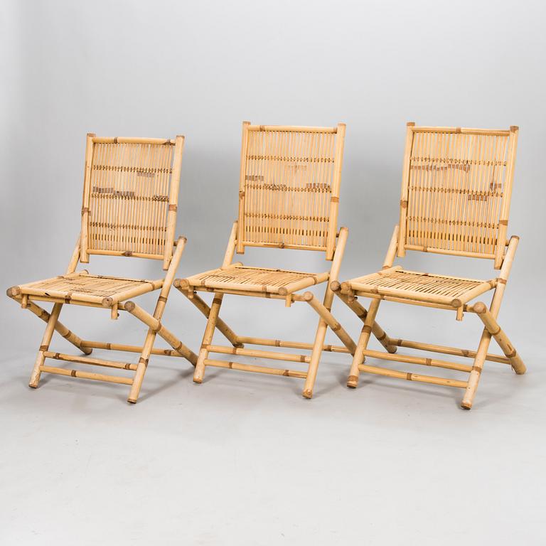 A 20th century four piece garden furniture set.