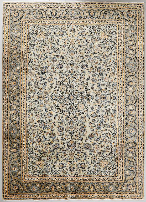 A Keshan rug, signed, ca 370 x 268 cm.