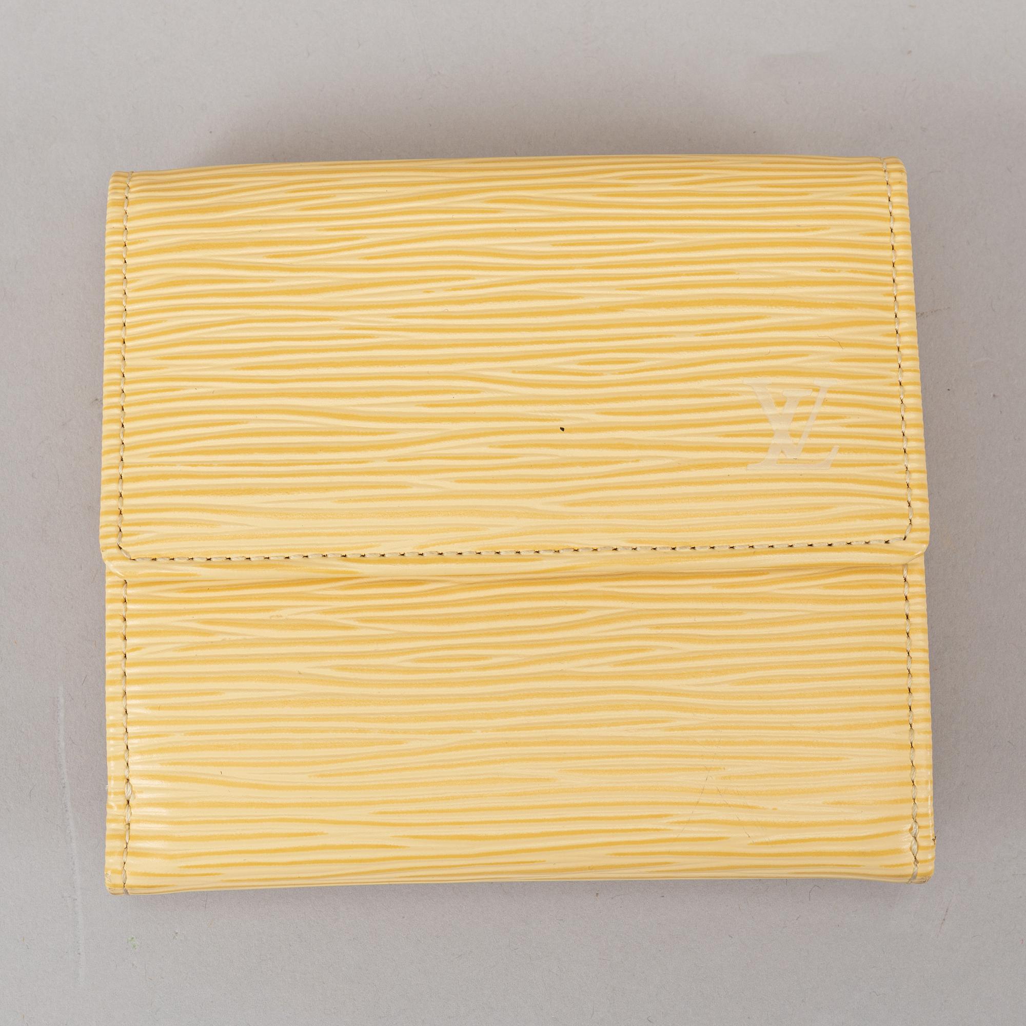 Louis Vuitton, 'Verseau Vanilla Epi leather bag' and wallet.