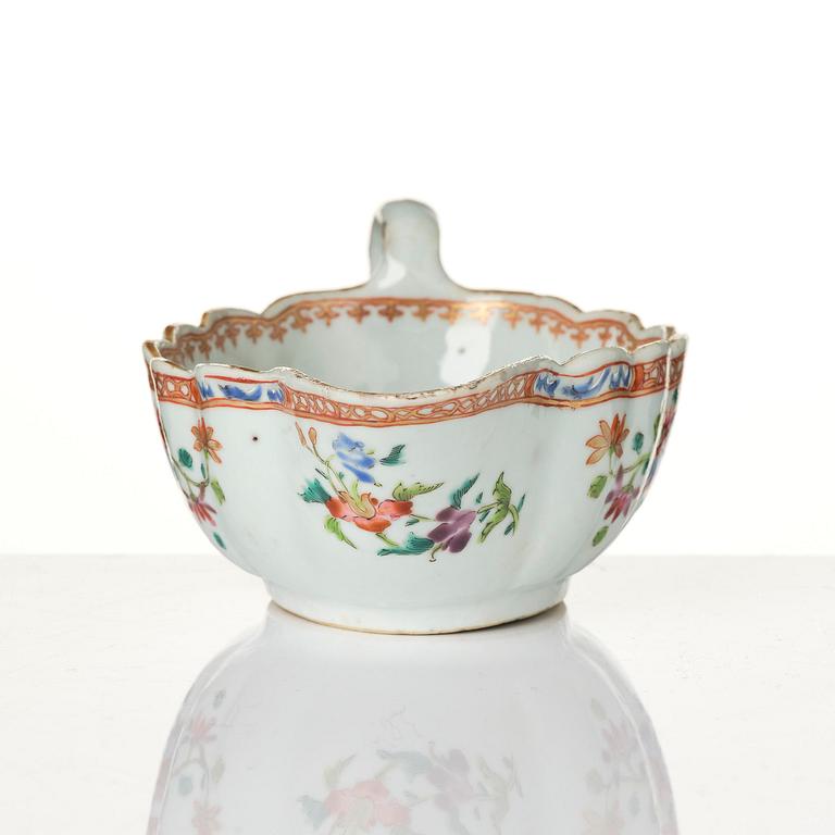 A group of famille rose 'double peacock' serving dishes, Qing dynasty, Qianlong (1736-95). (8 pieces).