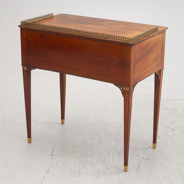 A late Gustavian mahogany table in the manner of C. D. Fick, Stockholm, late 18th century.