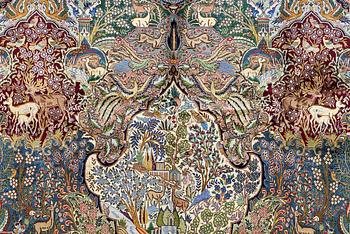 A Kashmar figural carpet. Circa 390 x 300 cm.