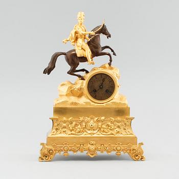 A late empire mantle piece clock, around mid 19th century.