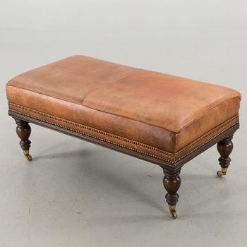 A CHESTERFIELD STYLE OTTOMAN, around year 2000.