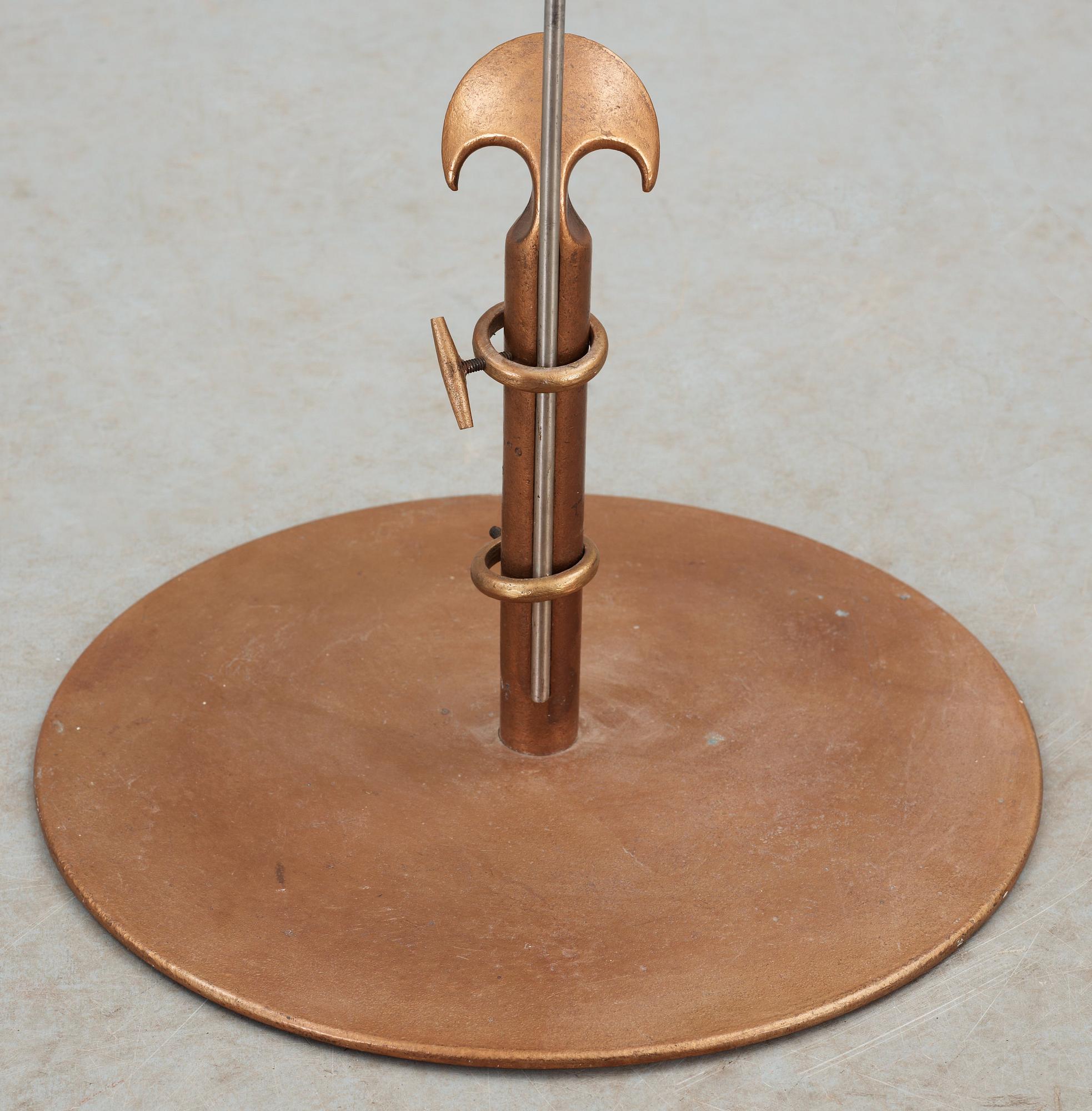 A Tore Ahlsén bronze and white metal floor lamp, 'Napoleon on the Nile', probably executed by NK, 1940's.