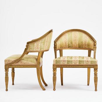 A pair of late Gustavian open armchairs attributed to E. Ståhl (master in Stockholm 1794-1820).