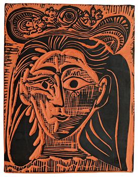 1338. A Picasso earthen ware plaque,  "Femme au chapeau fleuri", Madoura, Vallauris, France 1964.