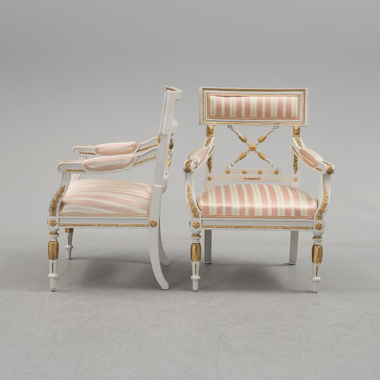 A set of two armchairs, a sofa, a stool and a chair. Early 20th century.
