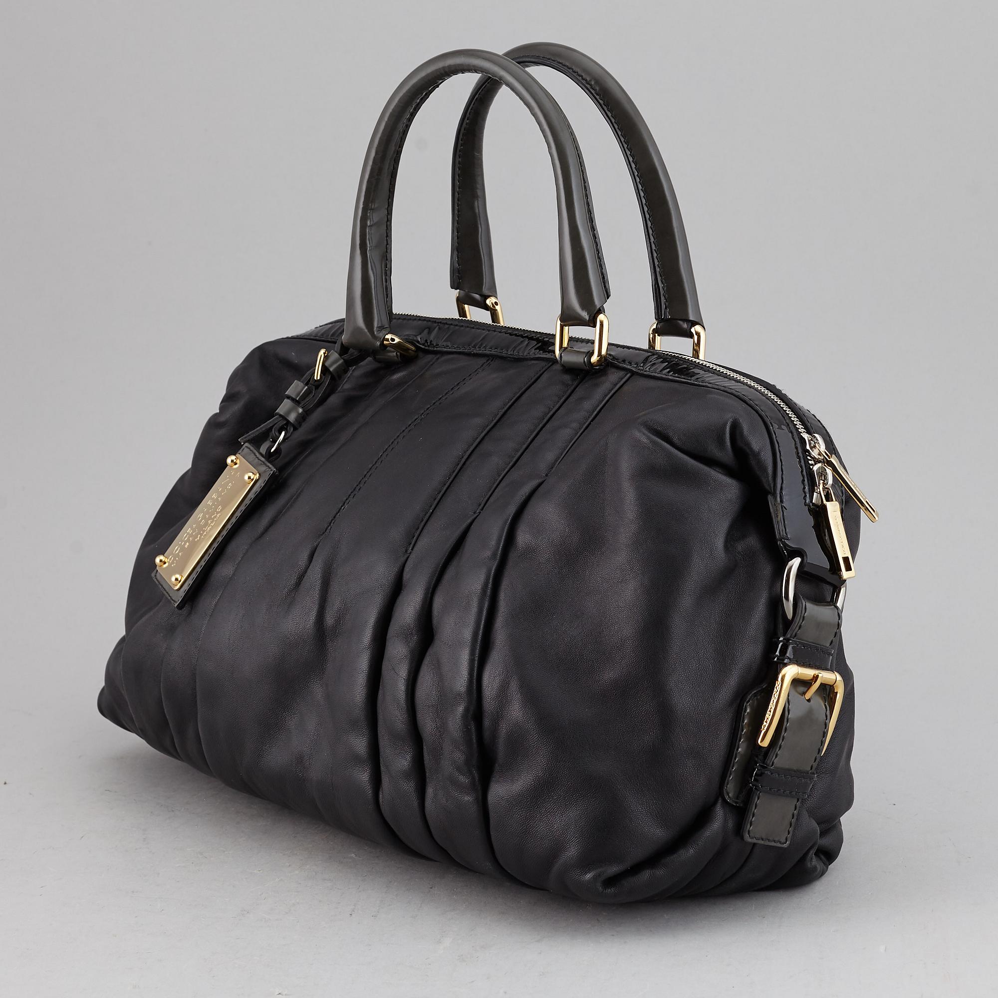 DOLCE & GABBANA, a black leather bag.