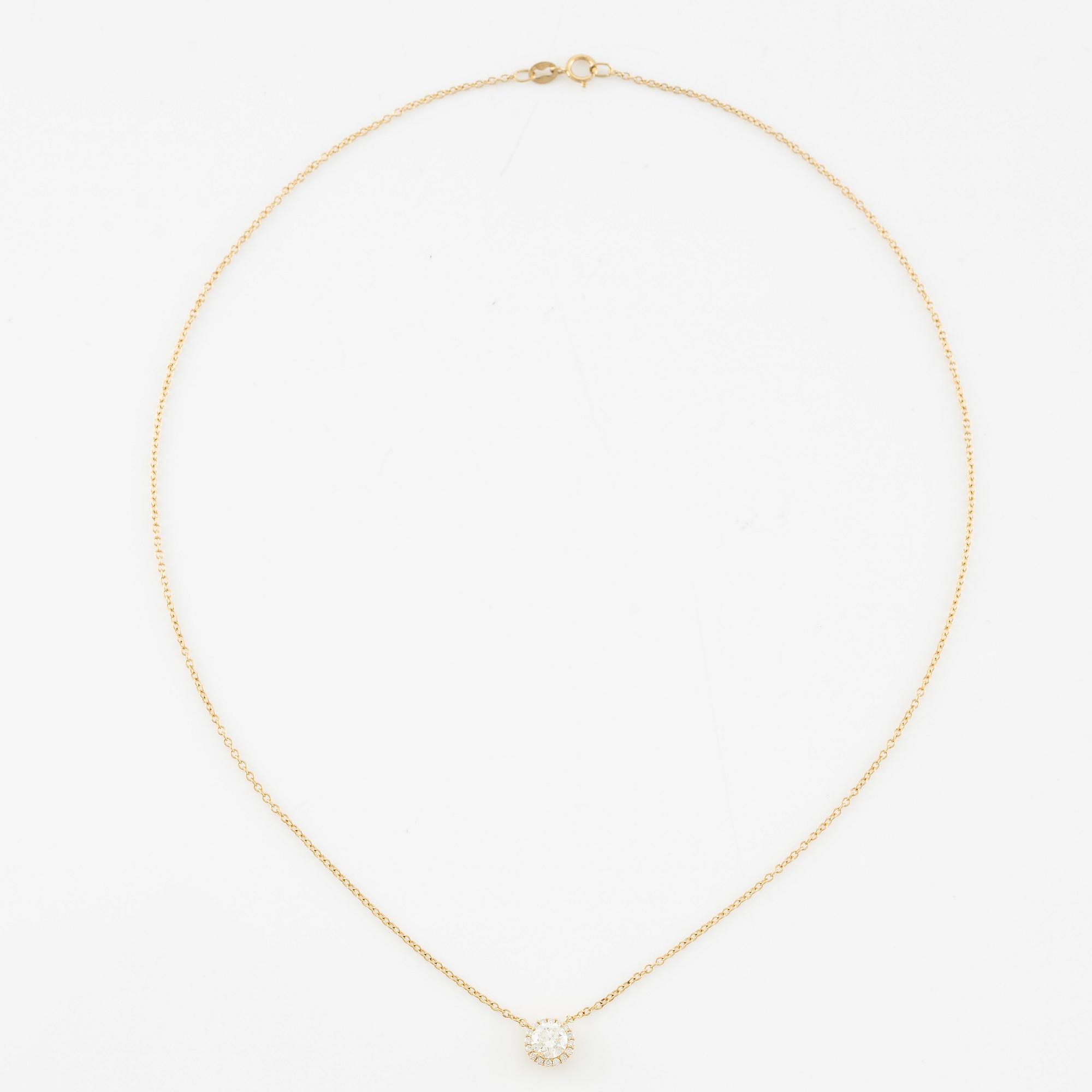 Collier 18K guld med briljantslipade diamanter.