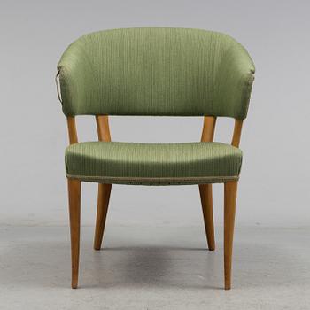 A "Lata Greven" armchair by Carl Malmsten.