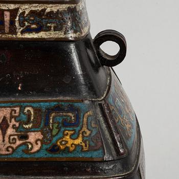 A bronze and cloisonne jar, China, circa 1900, with inscritption to base.