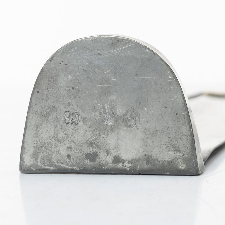 Nils Fougstedt, a matched pair of pewter and brass wall sconces, model A 60, Svenskt Tenn, Stockholm 1929 and 1932.