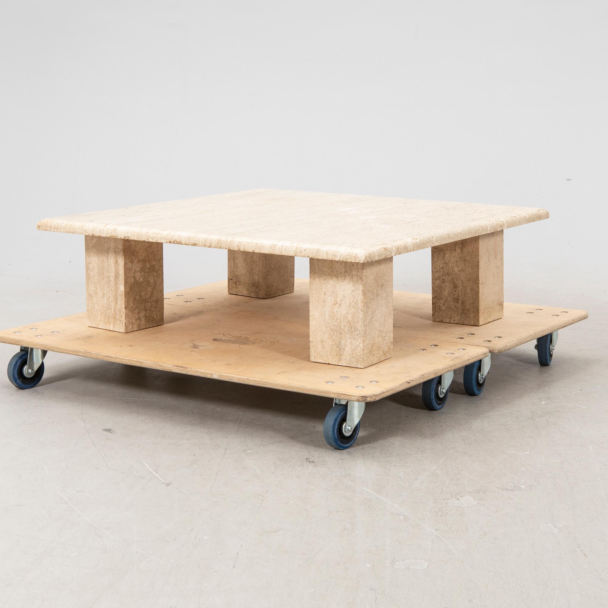 A late 20th century/21st century travertin coffee table.